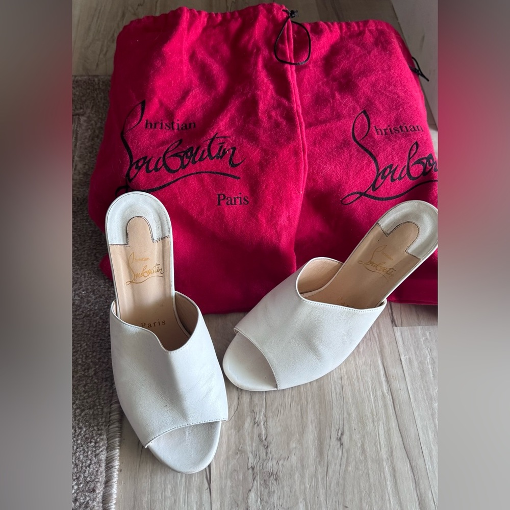 White Christian Louboutin heel mules, slide on red bottom heels with box